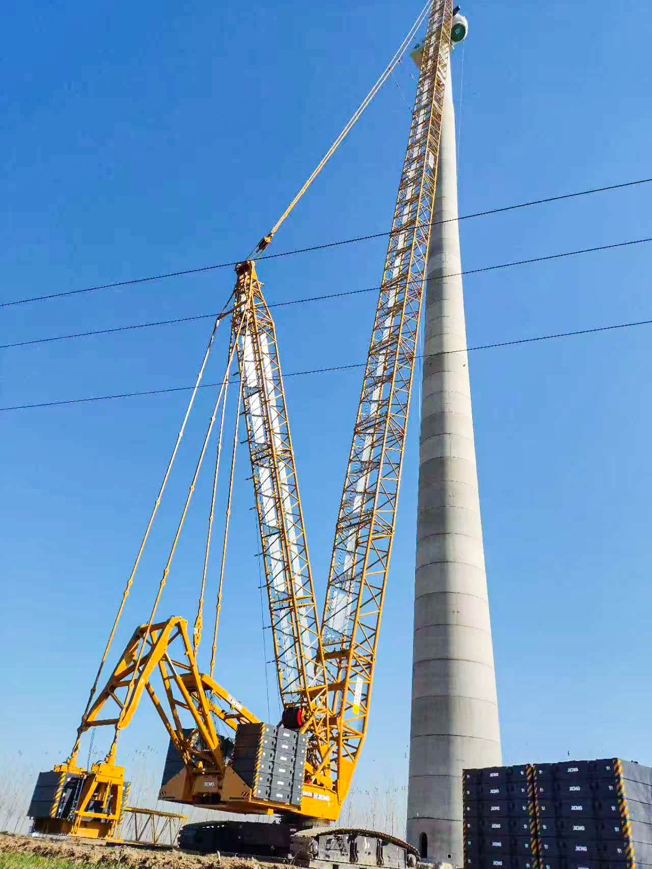 160米高空精准“搭积木”：js1996官网XLC15000M分体吊装6.25兆瓦风机全纪录